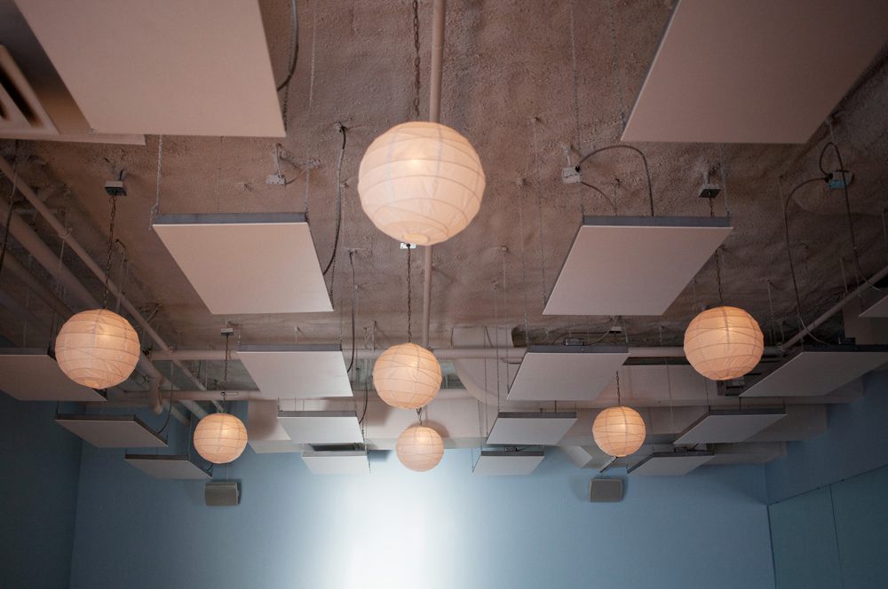 Ceiling heaters and paper lanterns in the Modo Yoga studio in Fredericton