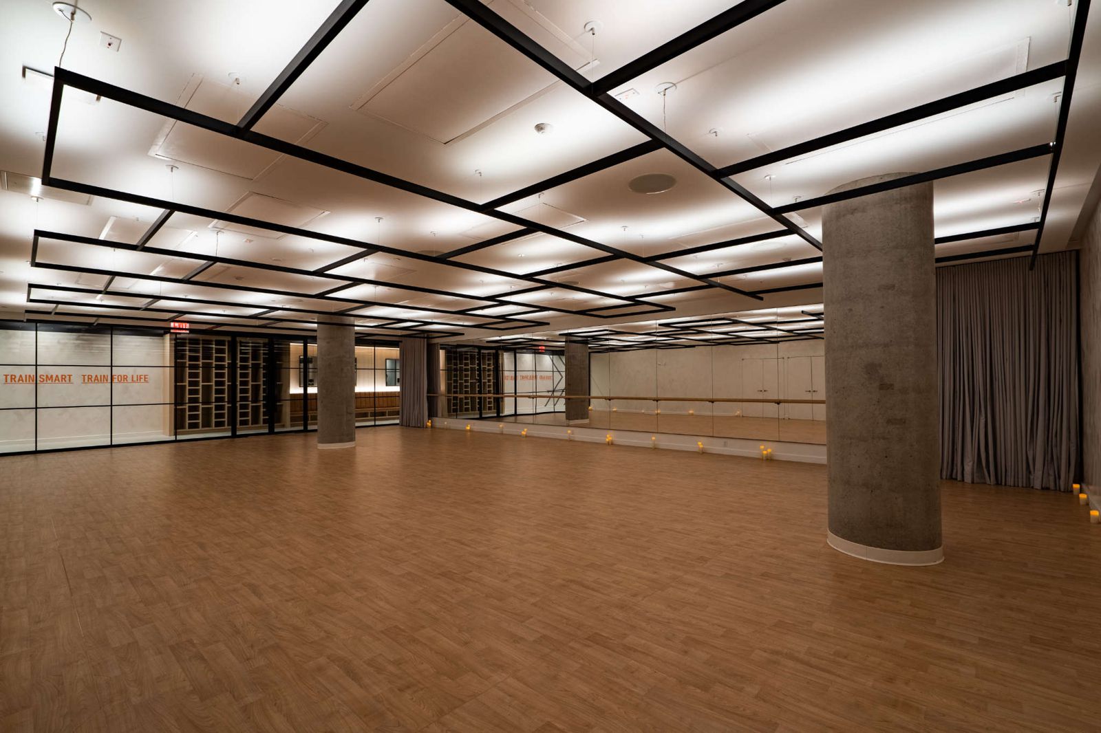 Empty Performance Lab studio at The JACX with Architectural Series heaters recessed in the ceiling