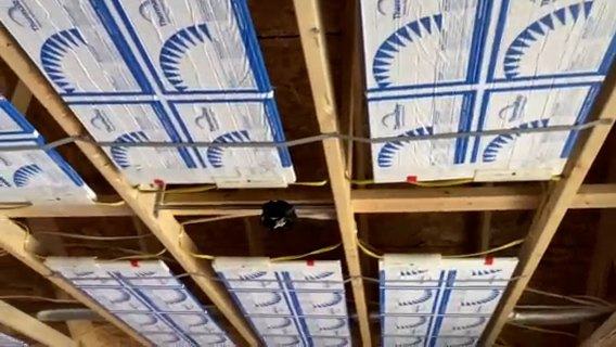Wired heating panels tested and ready for inspection