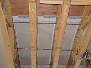 Radiant Floor Joist Heating Panel Installation